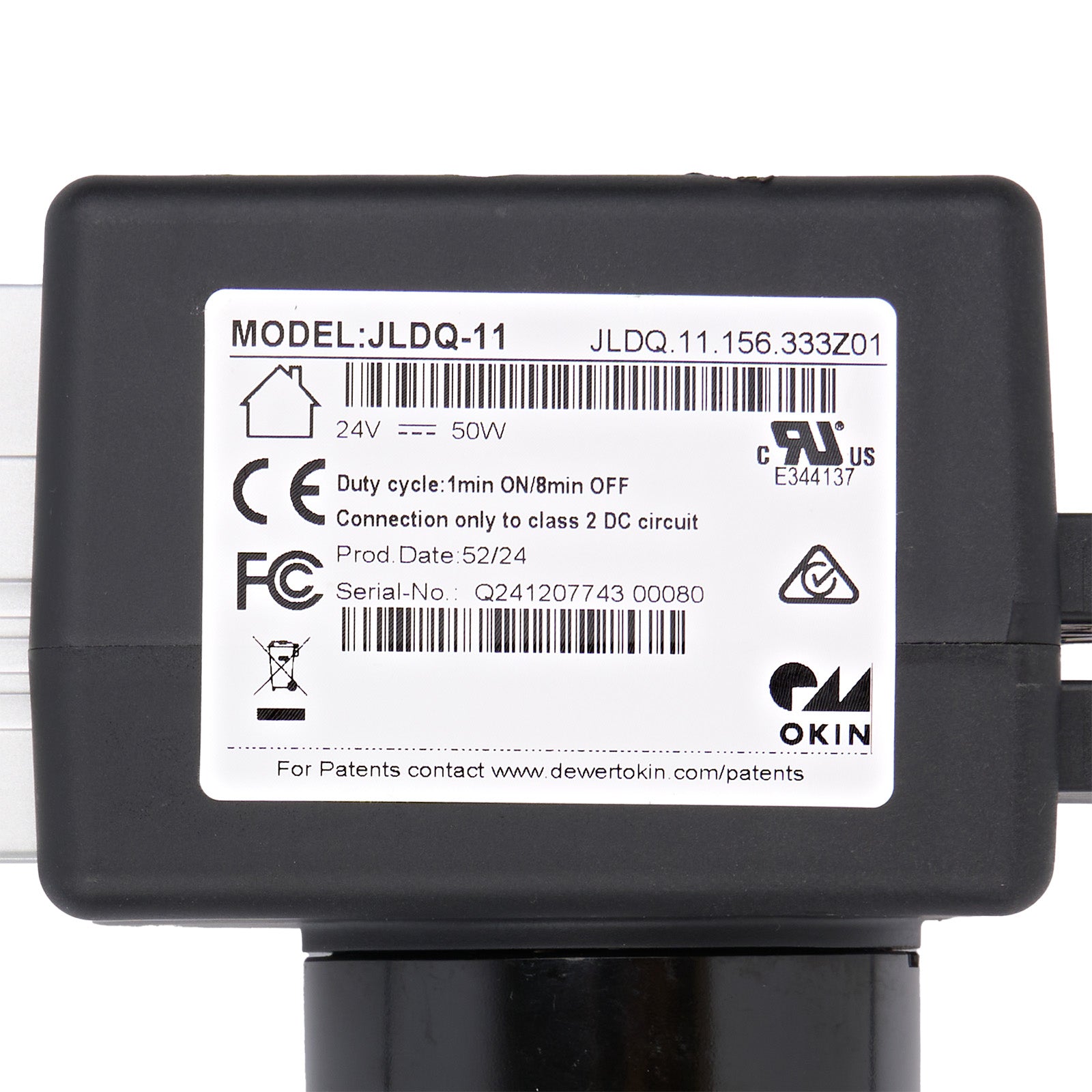 Black electronic device with a label on a white background