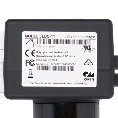 Black electronic device with a label on a white background