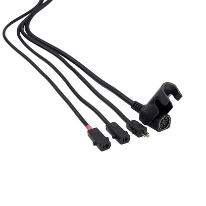 Set of black cables with various connectors on a white background