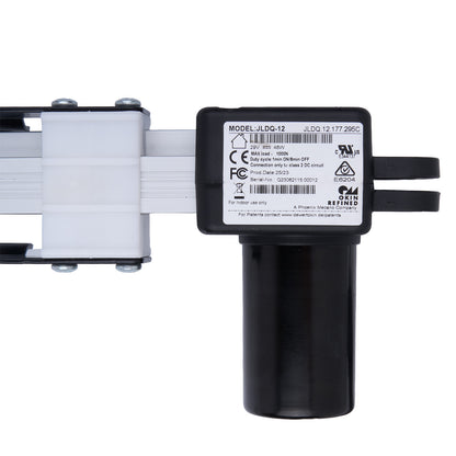 Black and white mechanical device with label on a white background