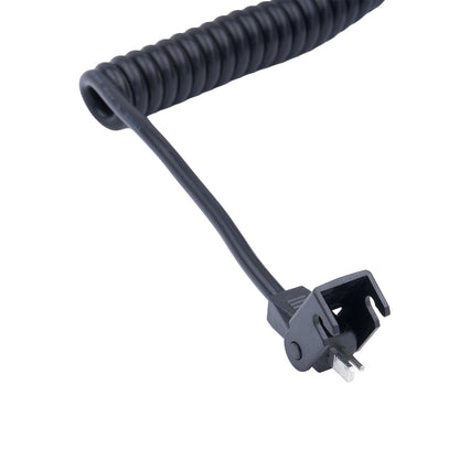 Black coiled cable with a plug on a white background