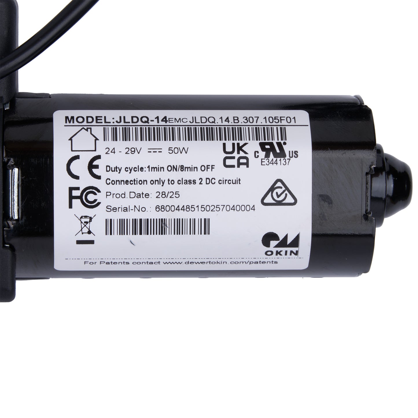 Black electrical component with a label on a white background
