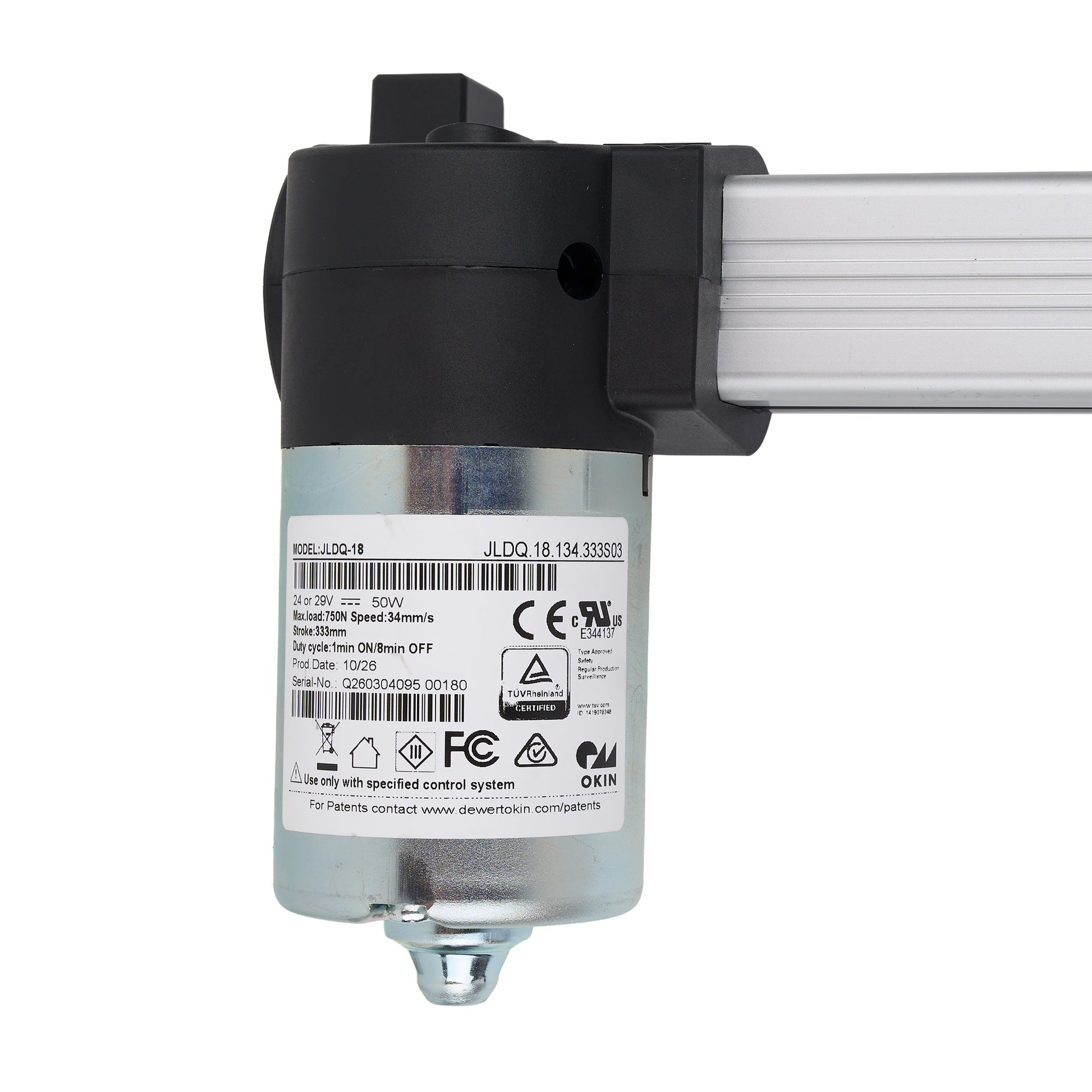 Close-up of a mechanical component with labels and certification logos on a white background