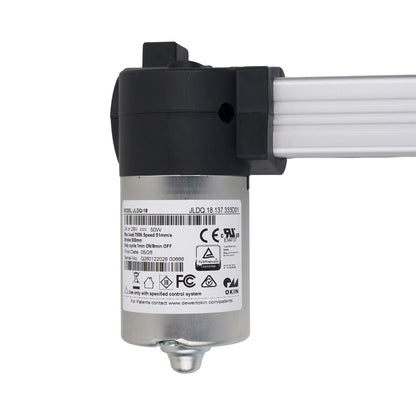 Mechanical component with visible branding and certification labels on a white background