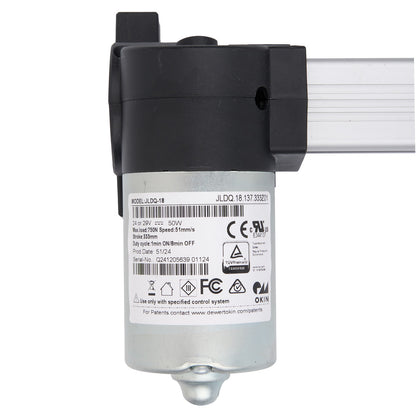 Electrical component with labels and certification marks on a white background