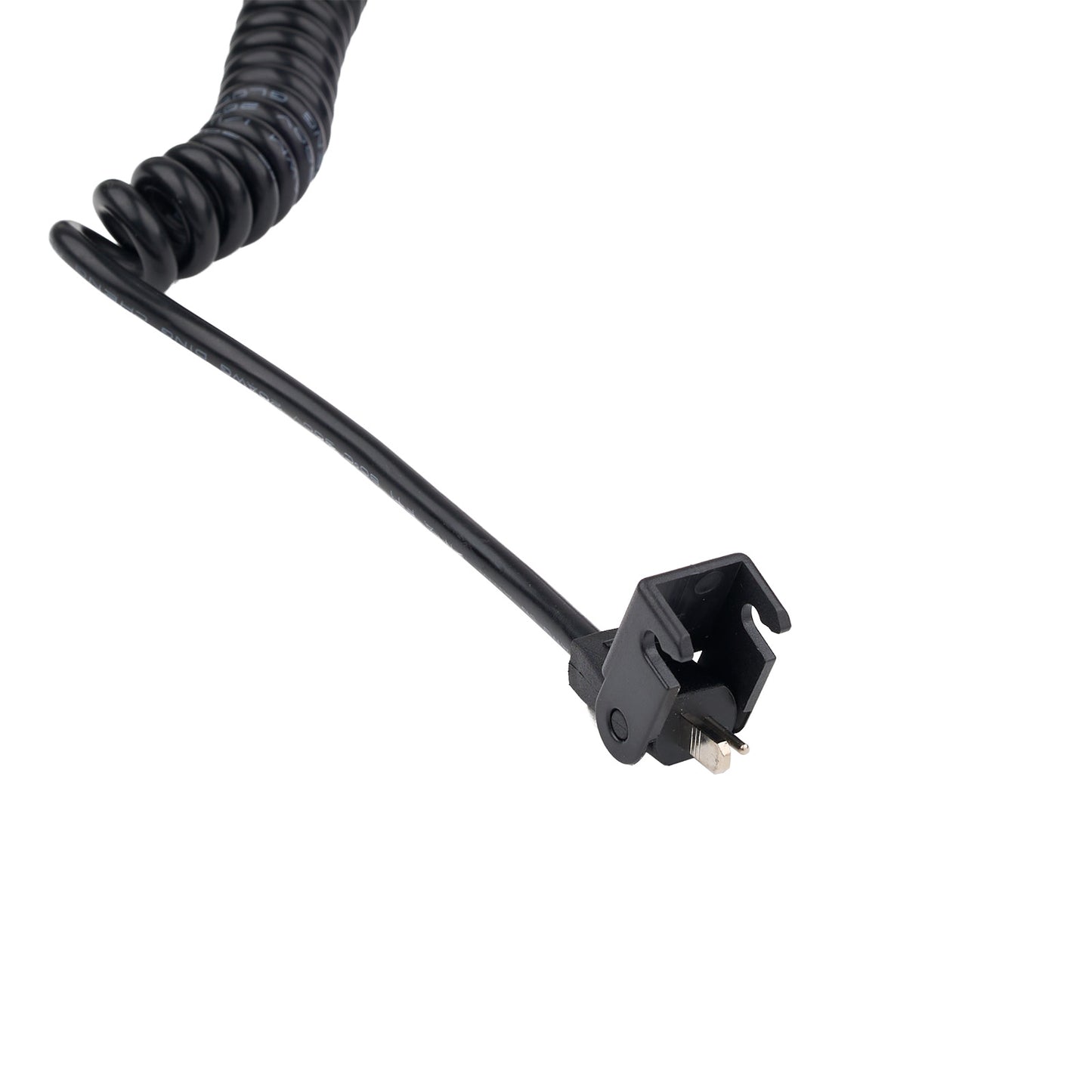 Black coiled cable with a plug on a white background