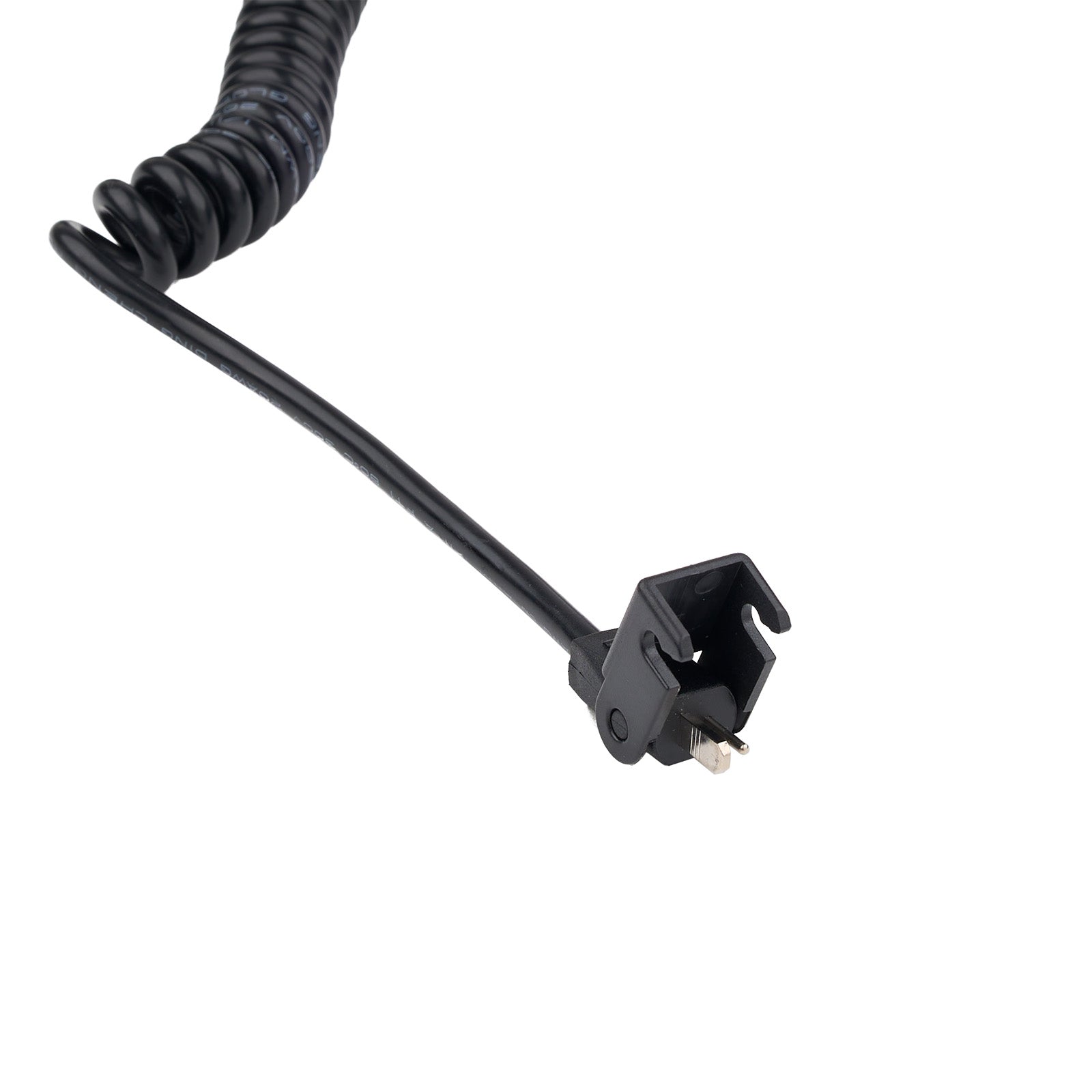 Black coiled cable with a plug on a white background