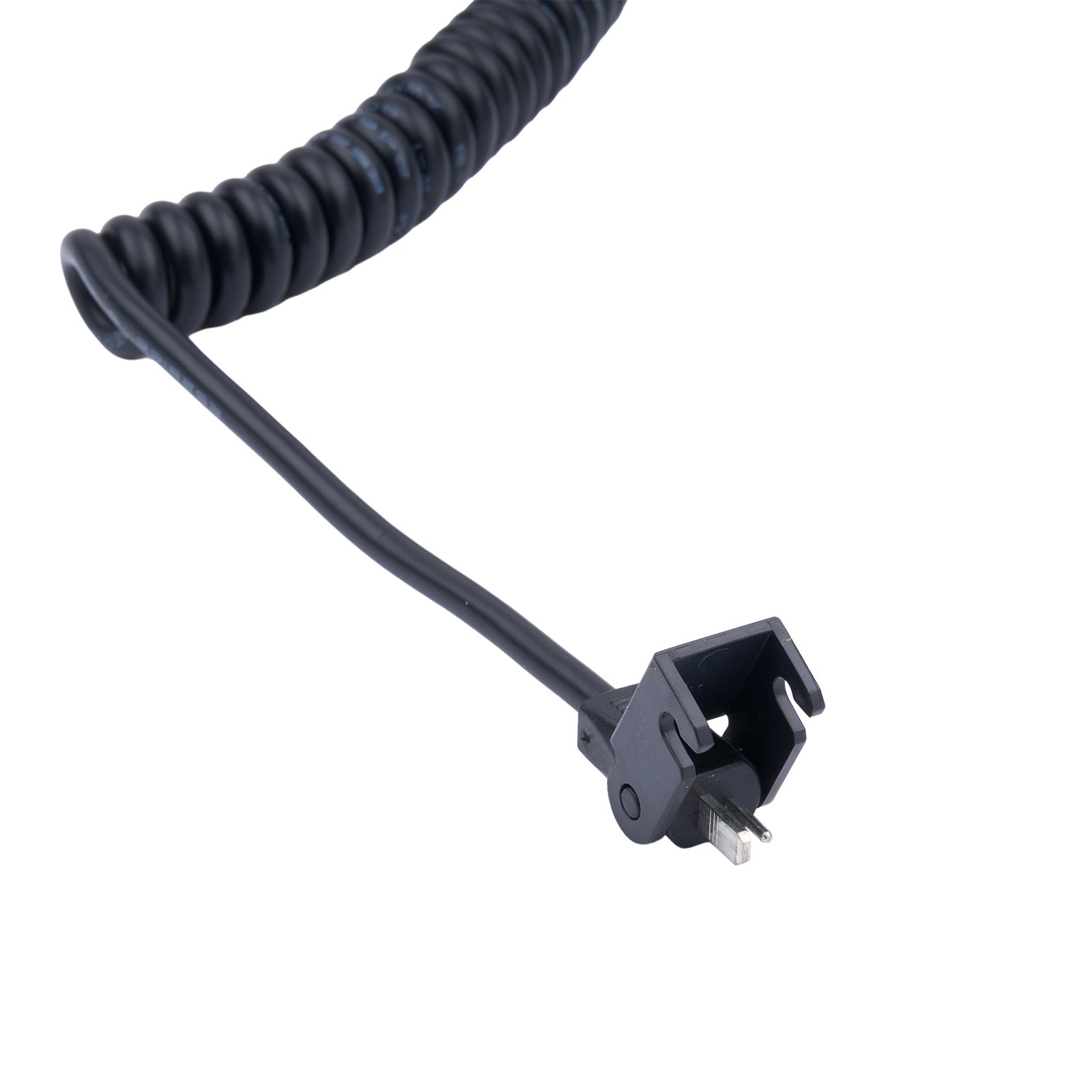 Black coiled cable with a plug on a white background