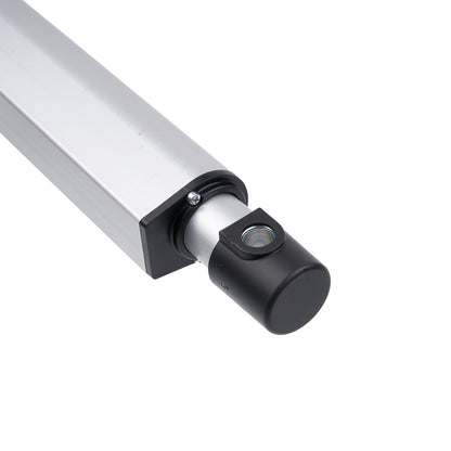 Close-up of a cylindrical metal component with a black cap on a white background