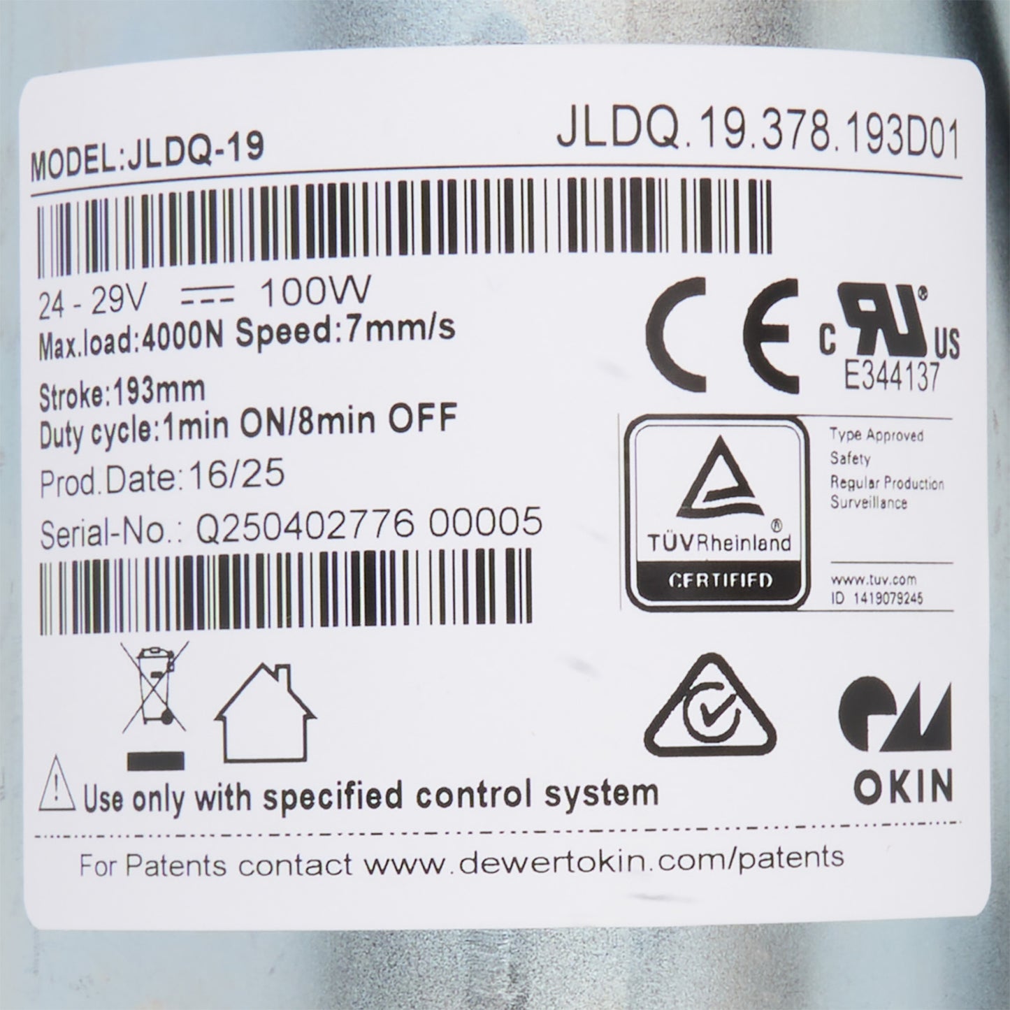 Technical label with specifications and certification logos on a cylindrical object