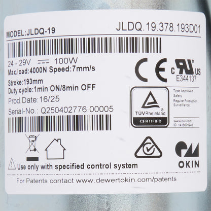Technical label with specifications and certification logos on a cylindrical object