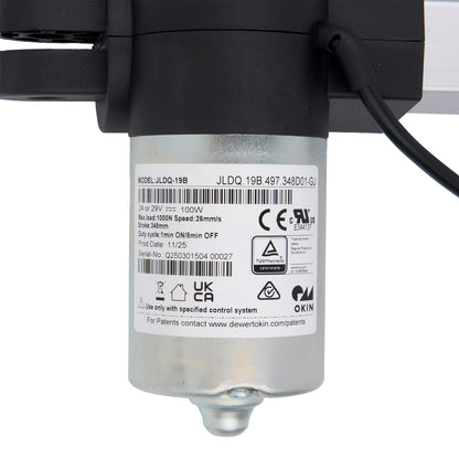 Close-up of a mechanical component with visible branding and specifications on a white background