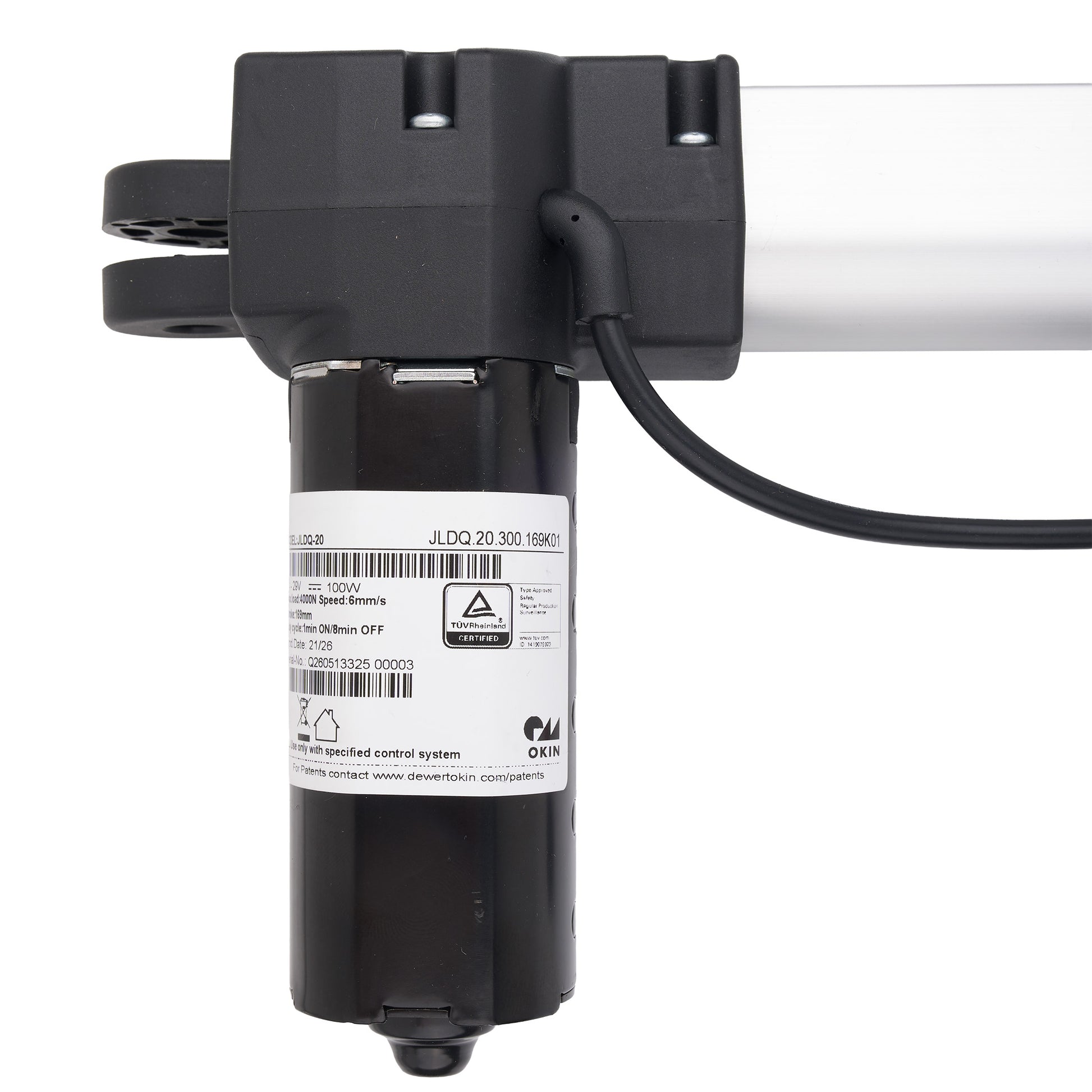 A close-up of a black cylindrical pump or filter component with a white label, attached to a black mounting bracket and a white horizontal tube, on a white background.