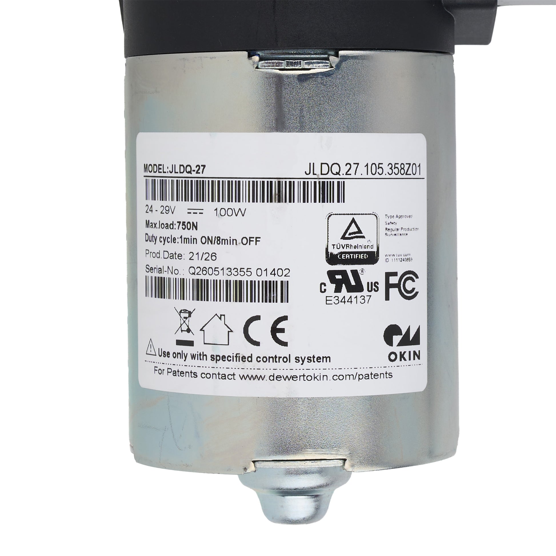 A silver cylindrical automotive electronic component with a black top cap and a white product information label showing model JL DQ-27 and various certification marks.