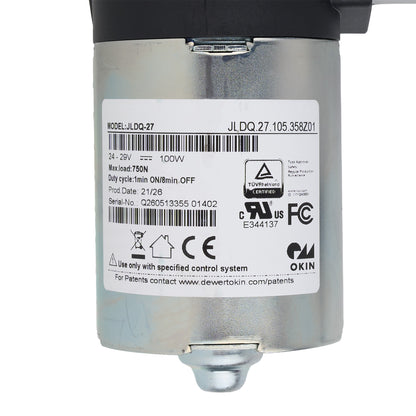 A silver cylindrical automotive electronic component with a black top cap and a white product information label showing model JL DQ-27 and various certification marks.