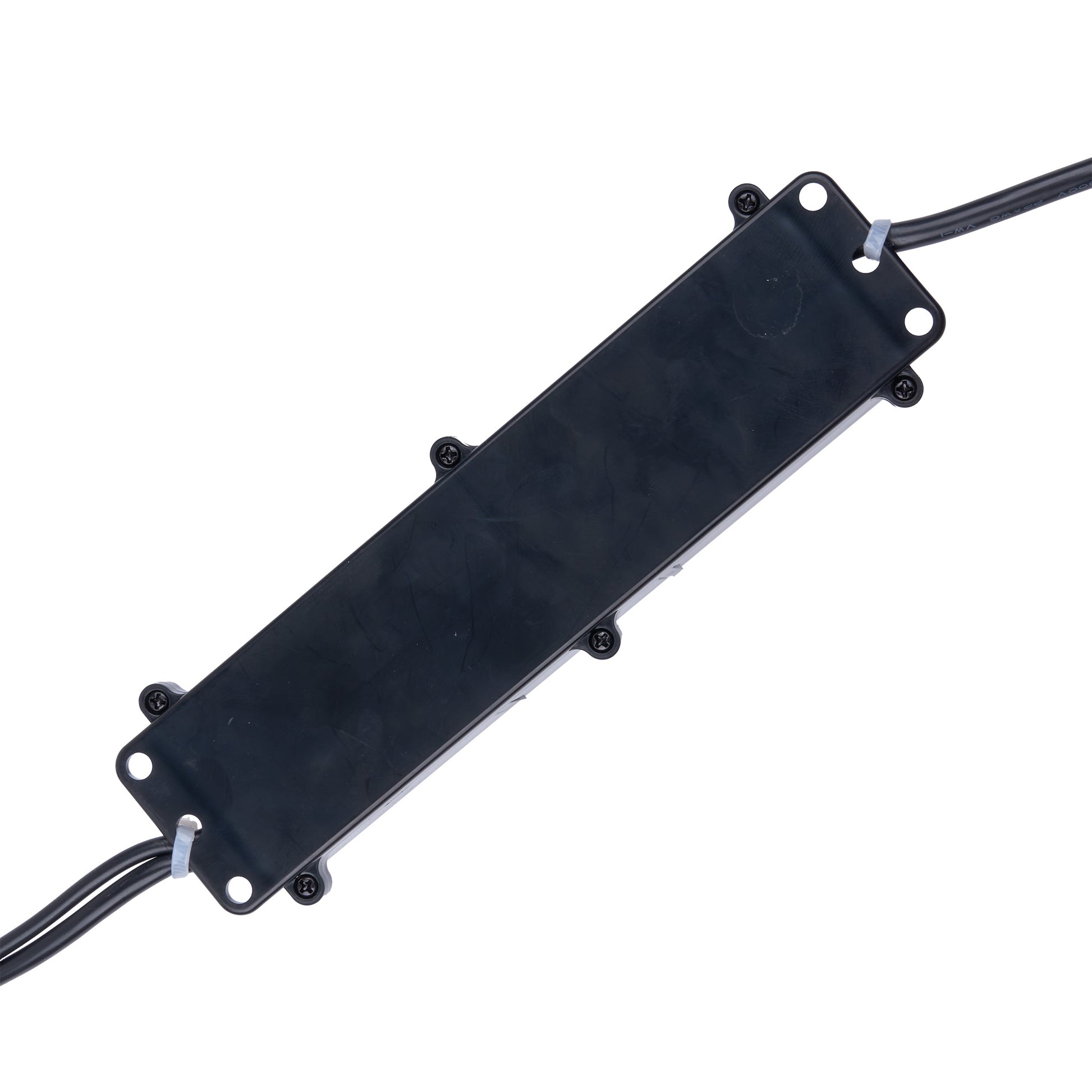Black rectangular electronic component with wires on a white background