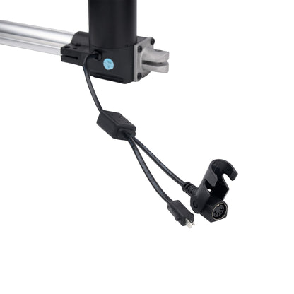 Mechanical arm with joints and cables on a white background