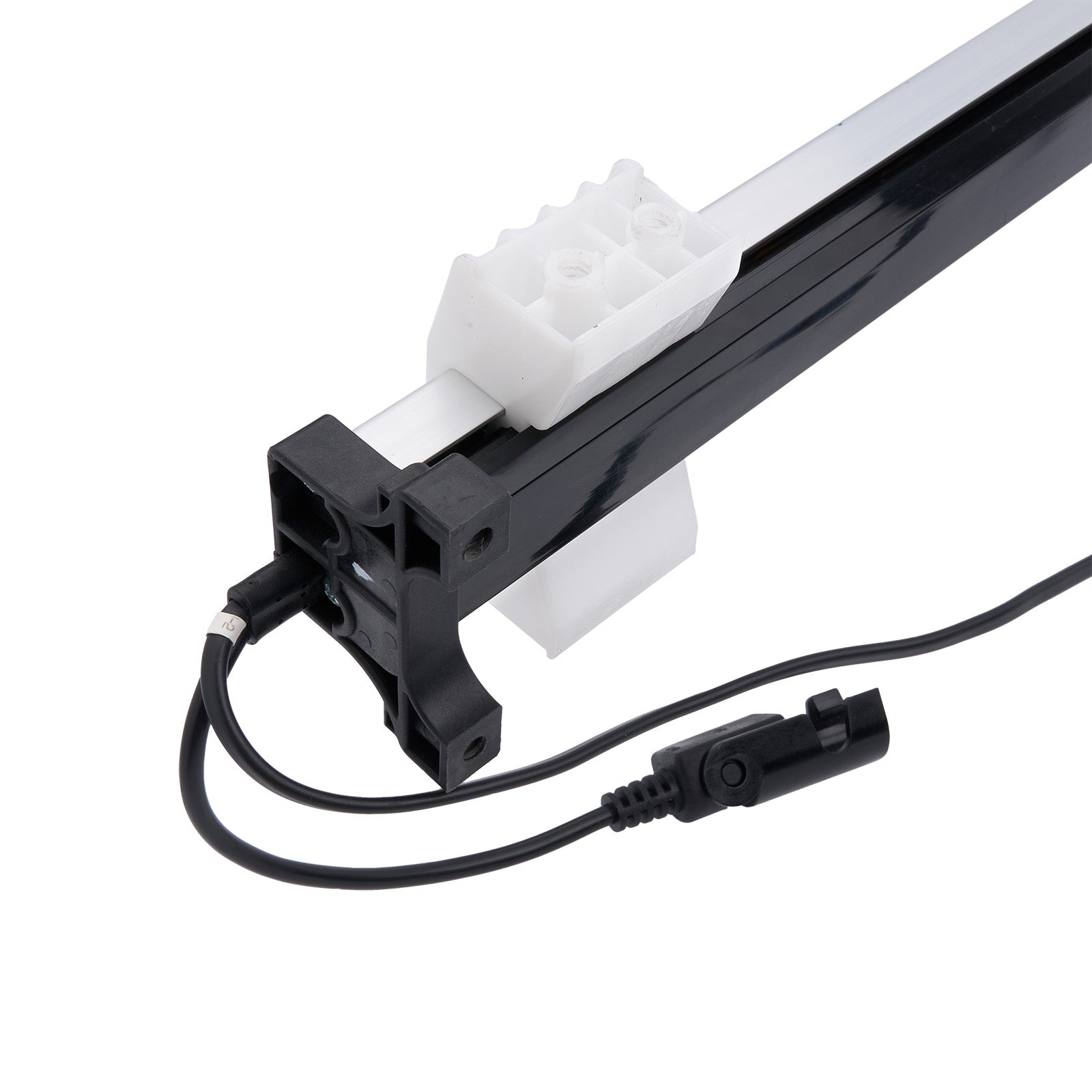 Black and white mechanical component with a cable on a white background