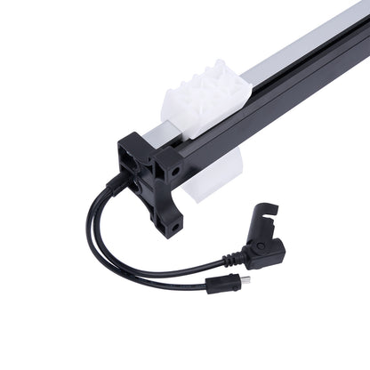 Light fixture with black housing and white diffuser on a white background