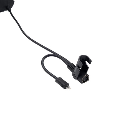 Black earbud with a clip on a white background