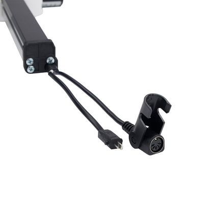 A close-up of a black electrical connector cable with a USB-C plug and a mounting clip, attached to a black rectangular component with silver screws, shown on a plain white background.