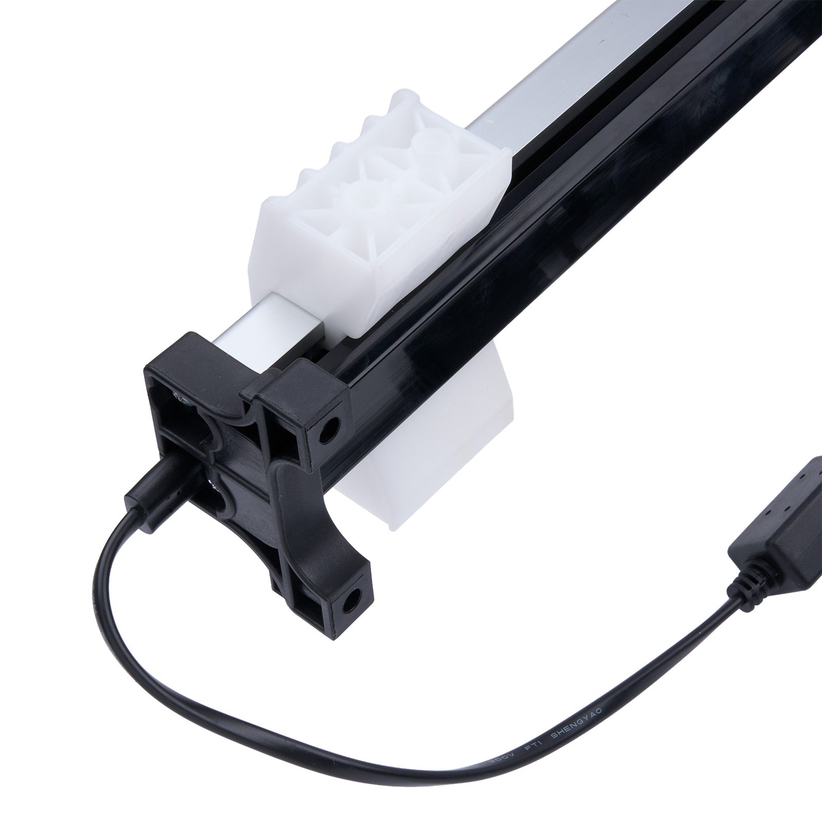 Mechanical component with gears and black cables on a white background