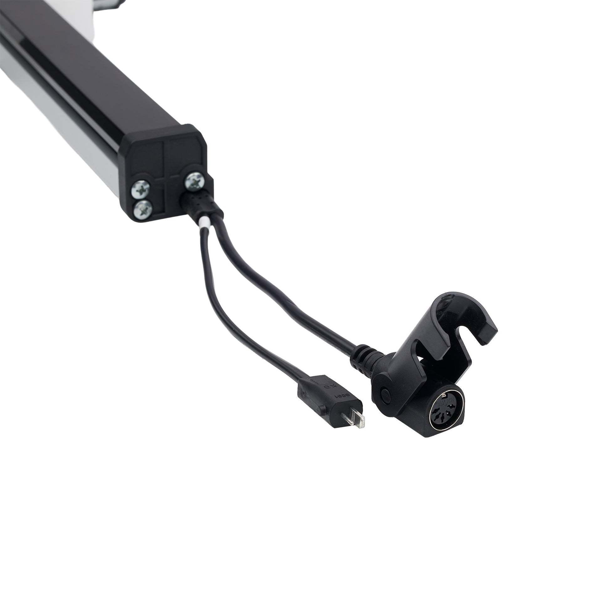A close-up of a black linear motor or similar industrial component with attached cables and a connector, shown on a plain white background.