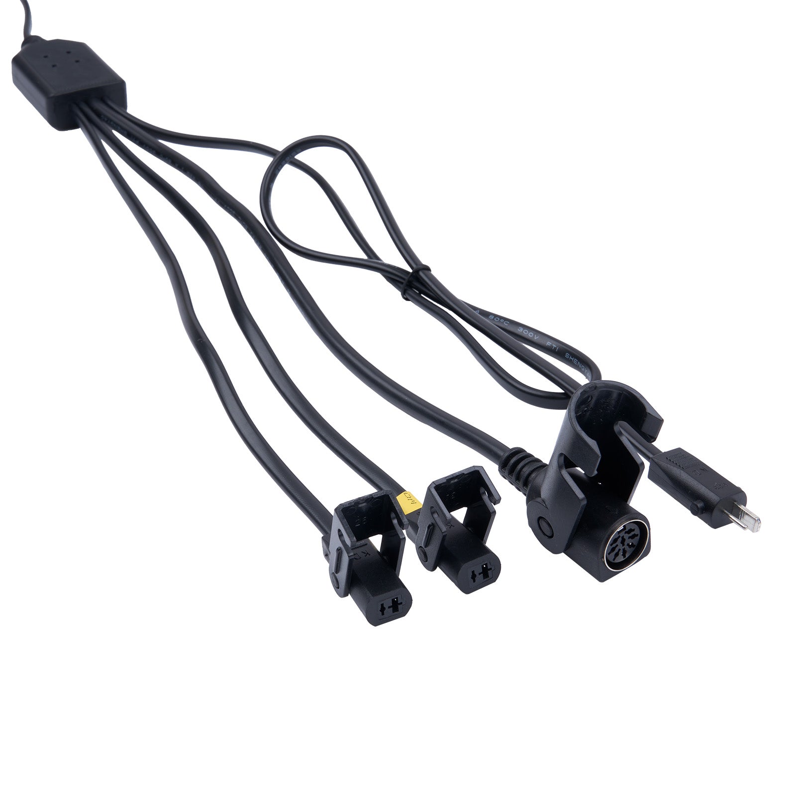 Set of black electrical cables with various connectors on a white background