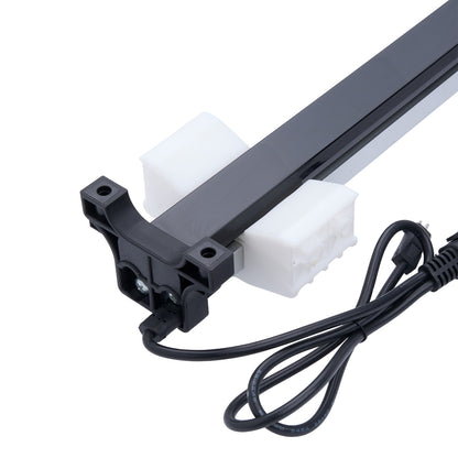 Light fixture with black and white components on a white background