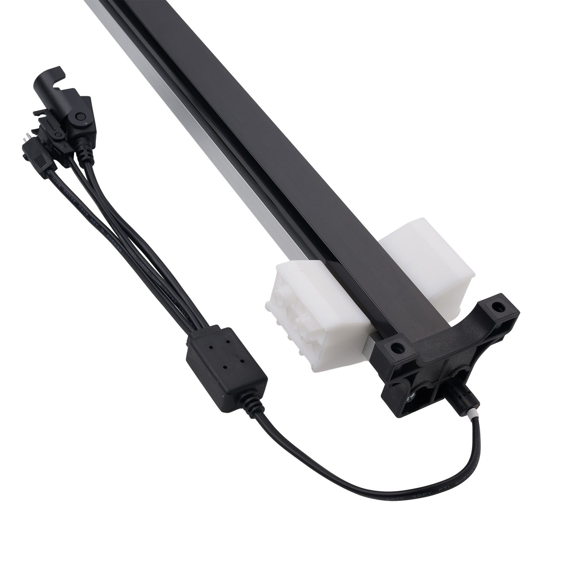 A black linear rail assembly with white plastic end blocks and attached black wiring harnesses, photographed on a plain white background.