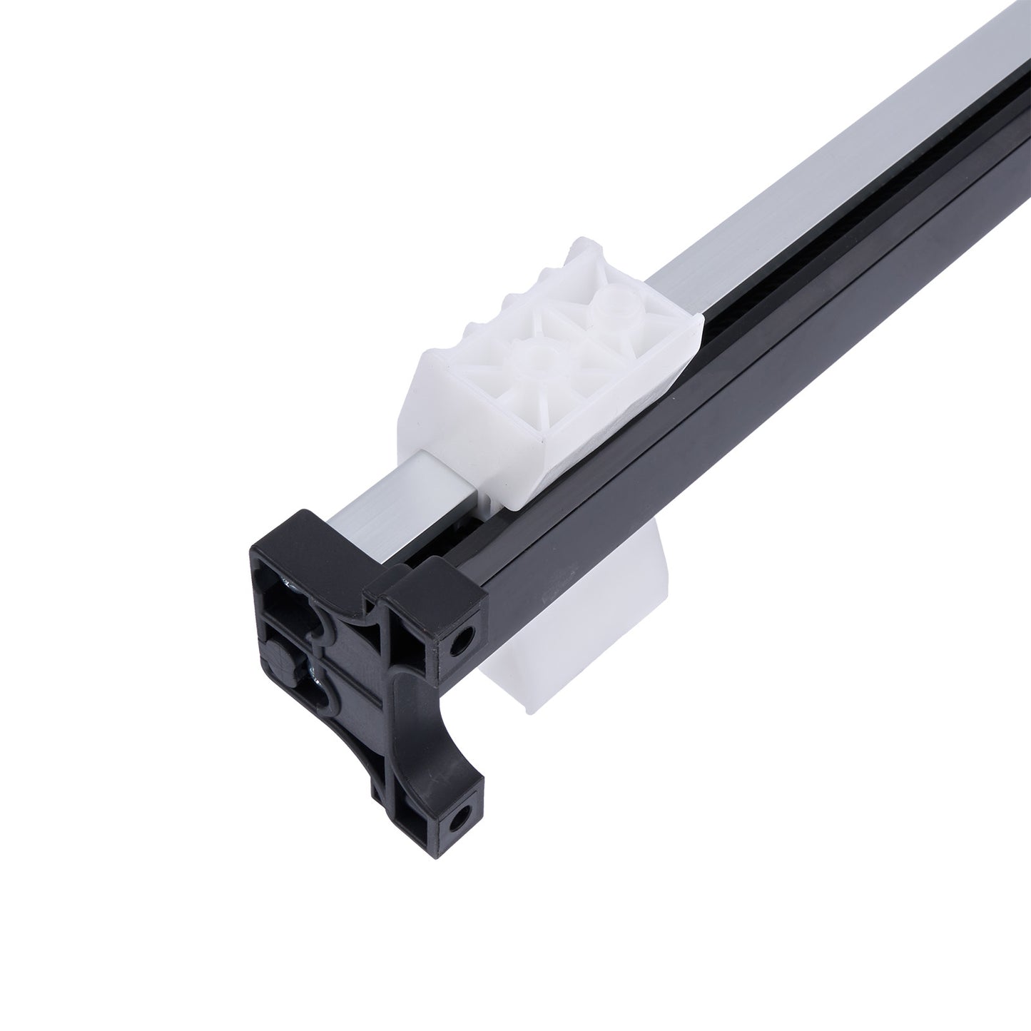 Close-up of a black and white plastic component on a white background