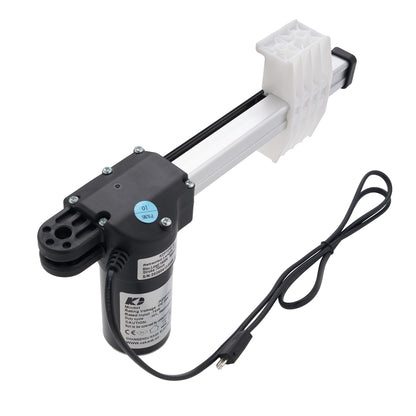 An electric linear motor slide with a black motor housing, white aluminum rail, and black cable on a white background.