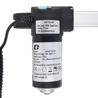 A black and silver linear motor with a coiled black cable, featuring white labels with product specifications and a KP brand logo, on a white background.