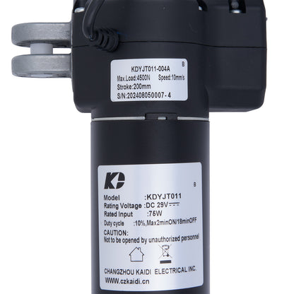 Close-up of a black mechanical component with labels and specifications on a white background