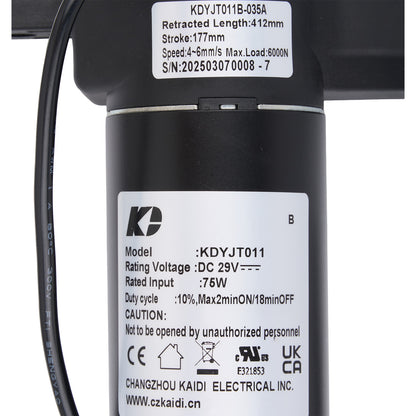 Close-up of a mechanical component with KD brand labels and technical specifications.