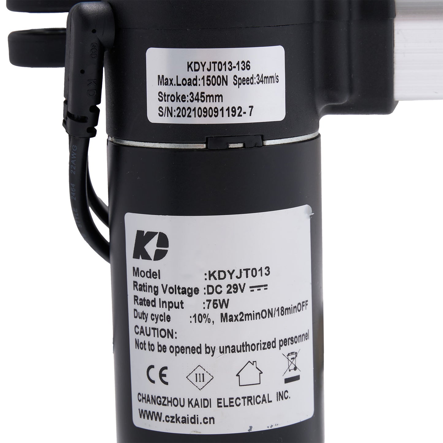 Black mechanical device with technical specifications label on a white background