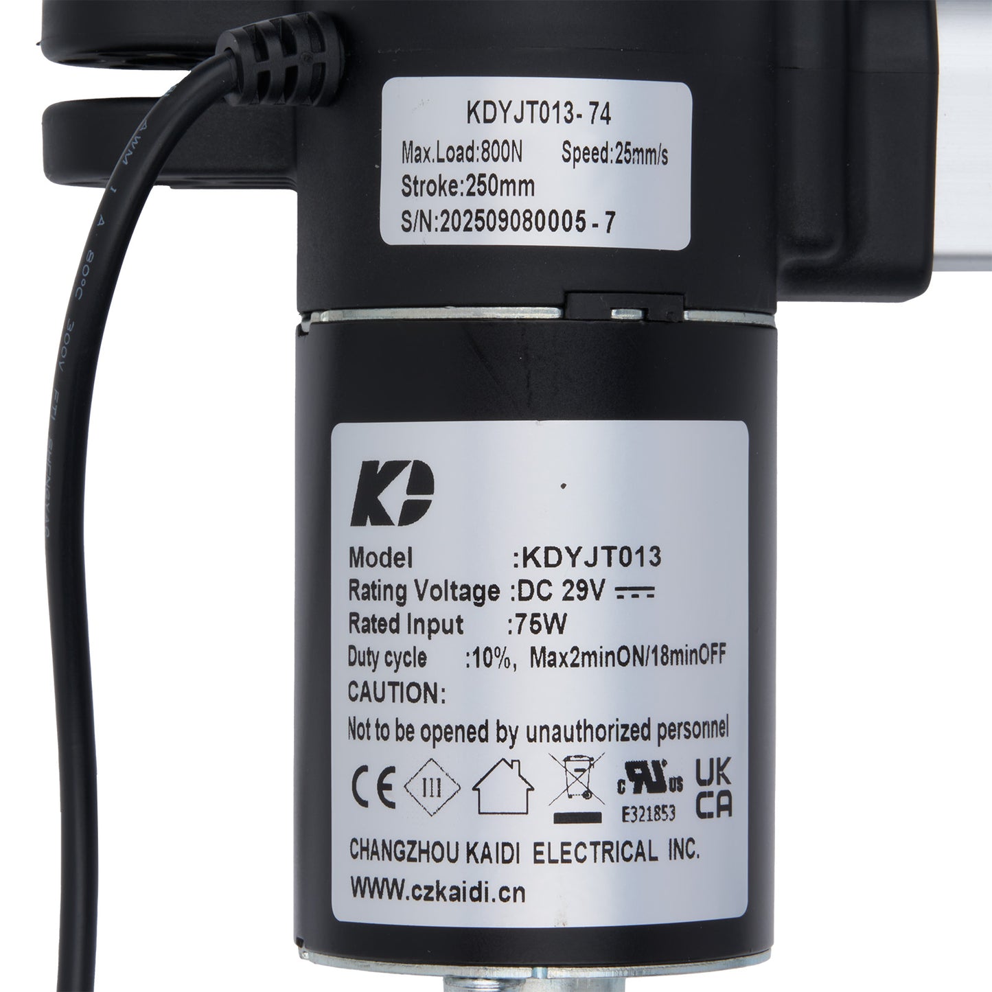 Technical specifications label on a black mechanical component with visible branding and text.