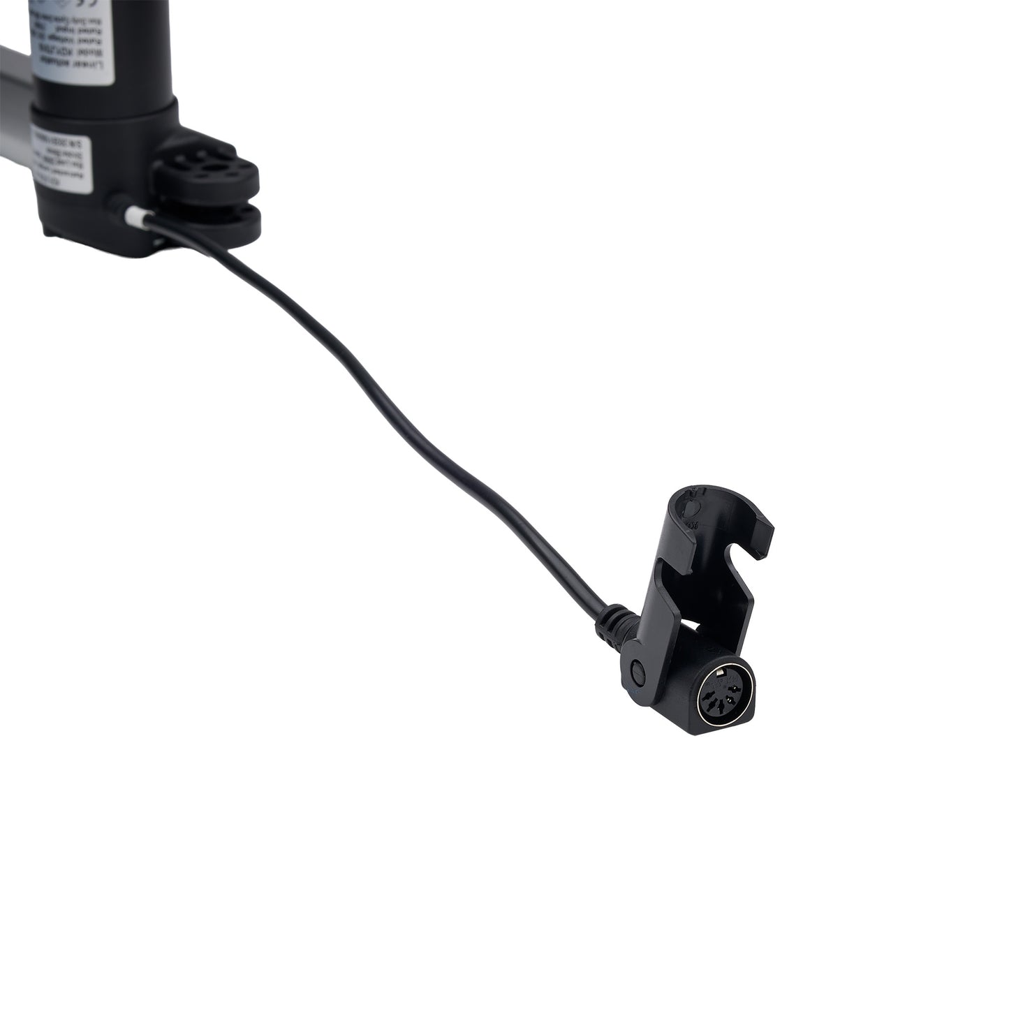 A close-up of a black mechanical component with a short black cable leading to a black clamp-like connector, shown on a plain white background.