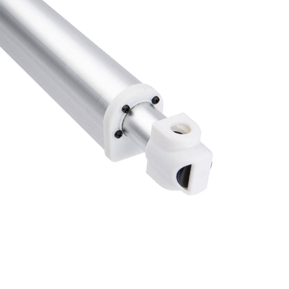 Metallic cylindrical object with a white end on a white background