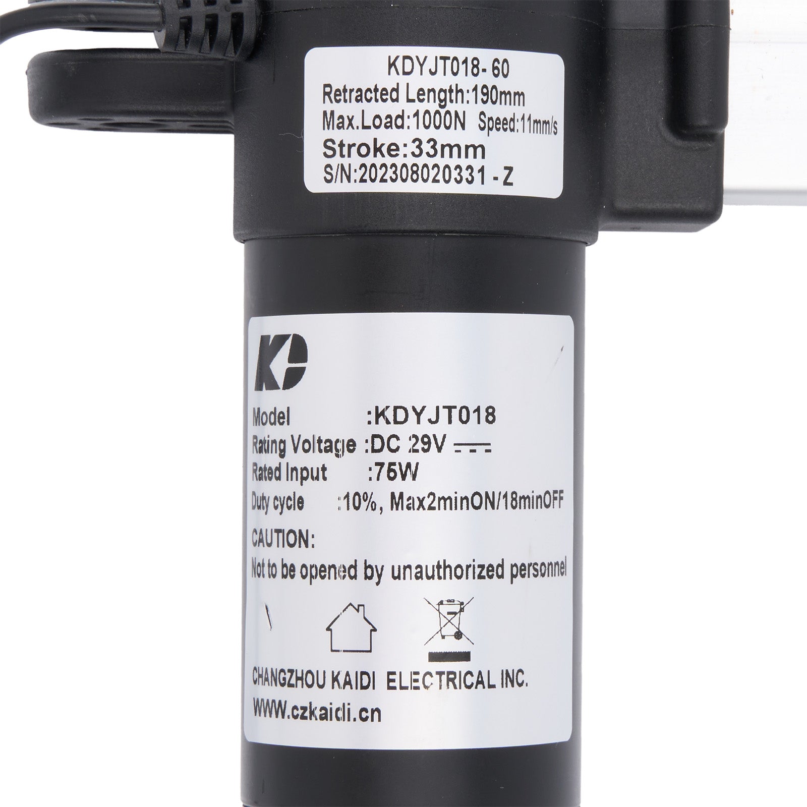 Technical label on a black mechanical component with specifications.