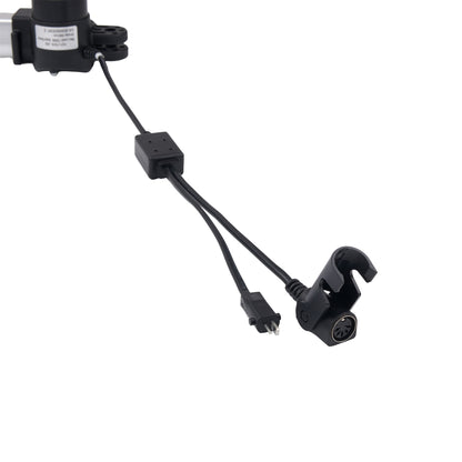 Black electronic control cable assembly with a motor, connector plug, inline switch, and mounting clip on a plain white background.