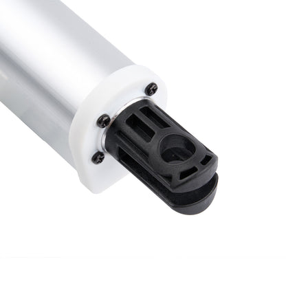 Close-up of a white cylindrical object with a black component on a white background