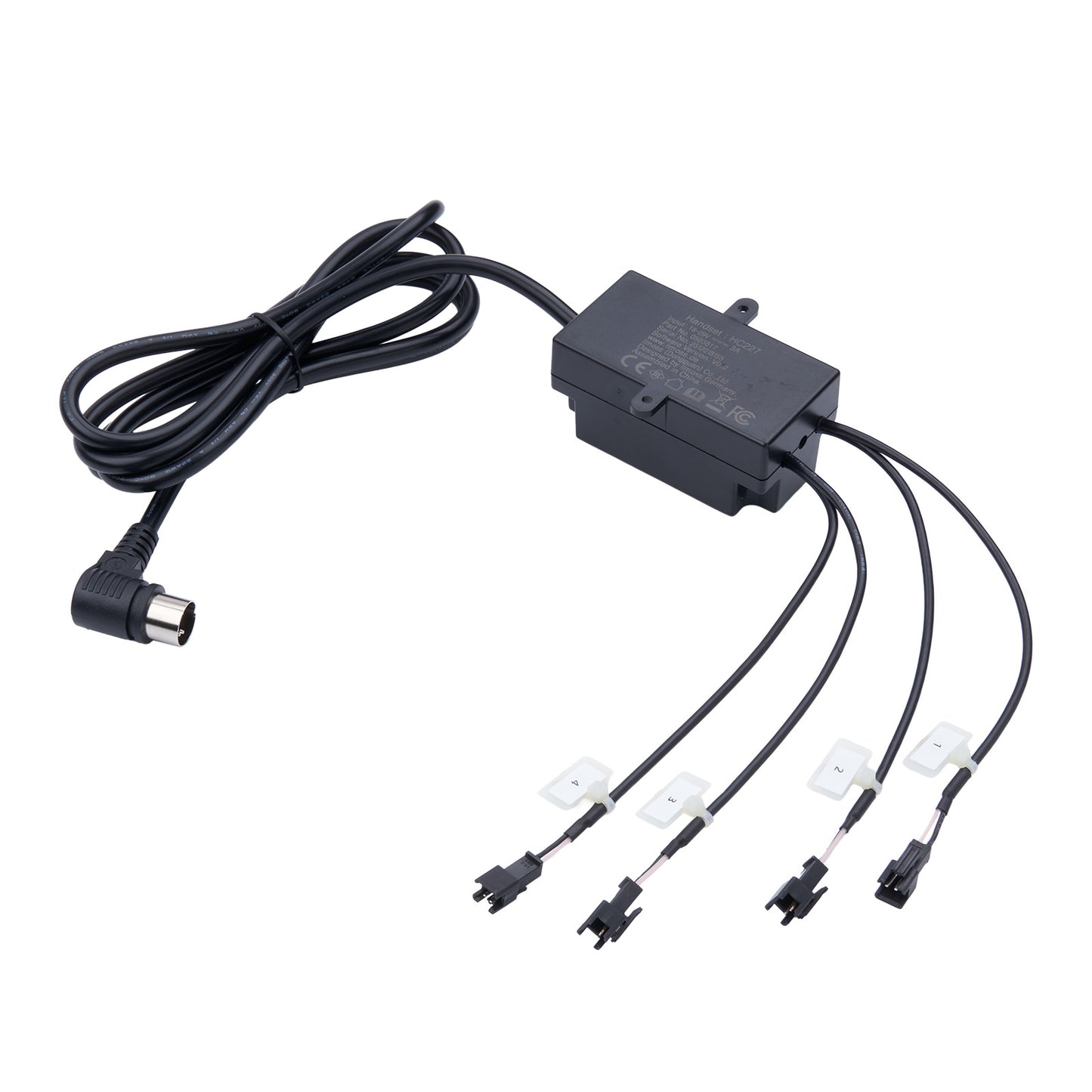 Black electronic component with multiple wires on a white background