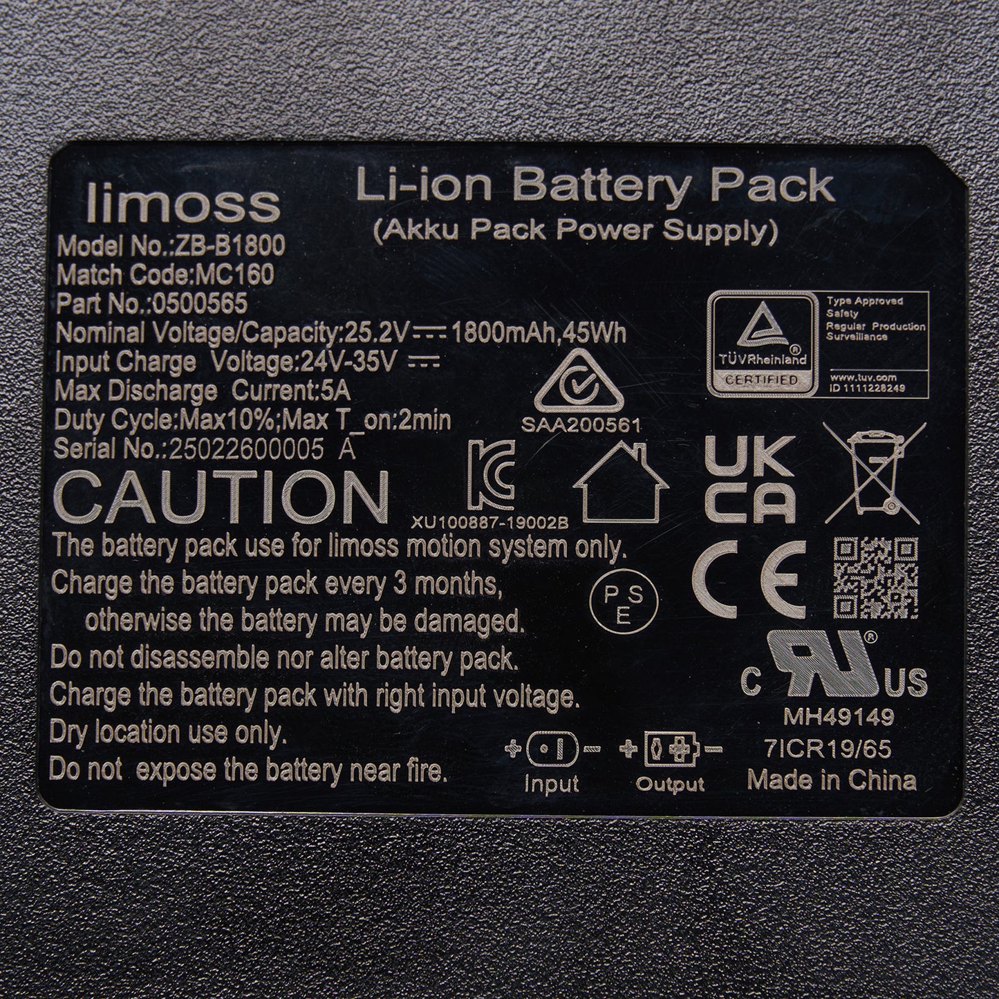 Back label of a limoss Li-ion battery pack on a gray background