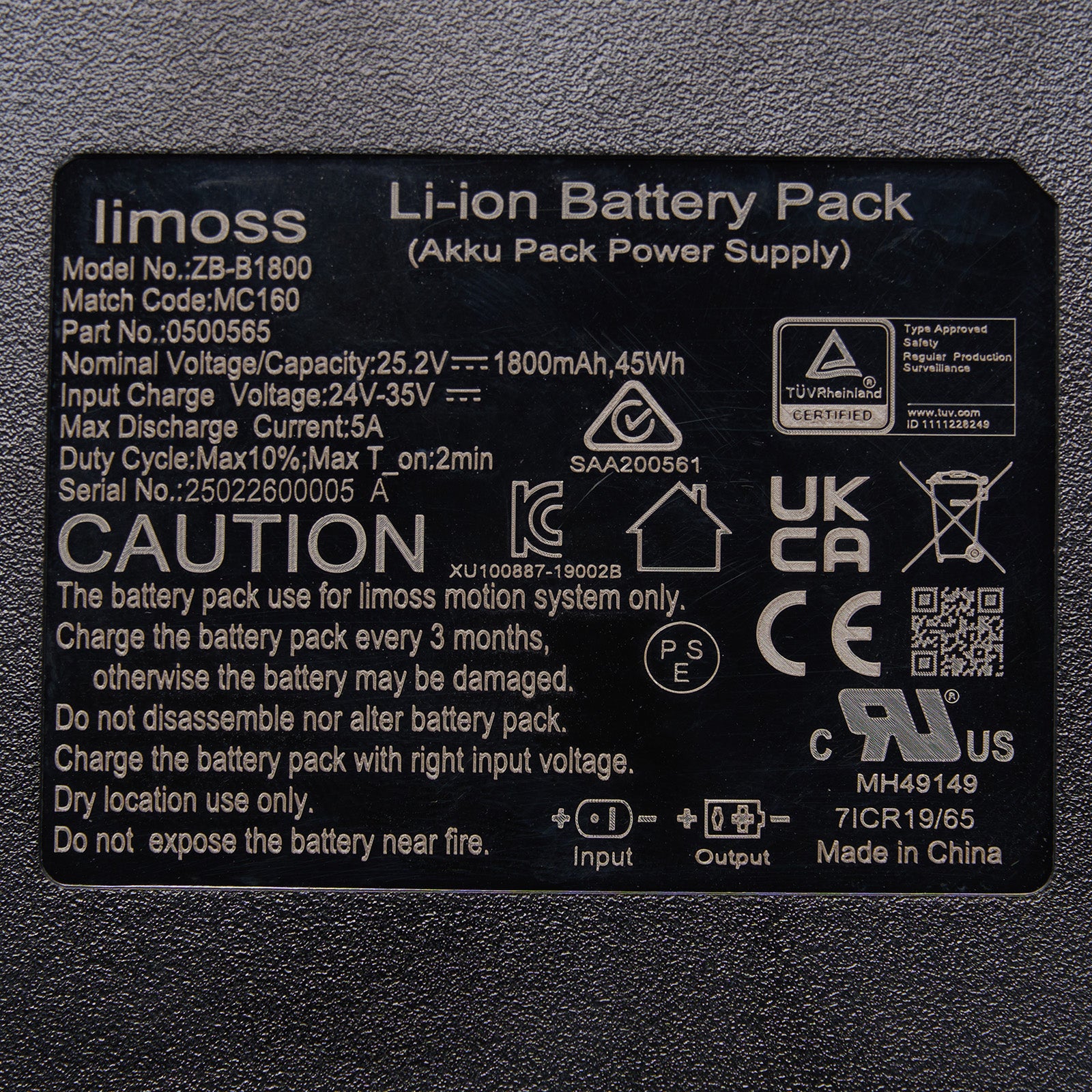 Back label of a limoss Li-ion battery pack on a gray background