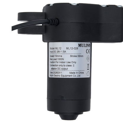 Black cylindrical device with a label on a white background