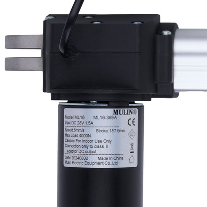 Black electric actuator with label on a white background