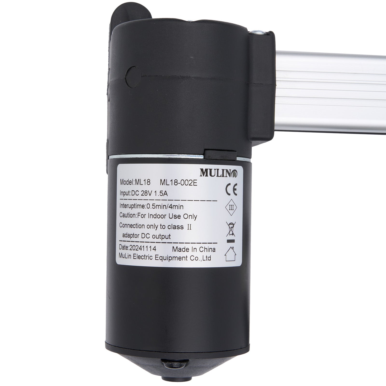 Black mechanical component with label on a white background