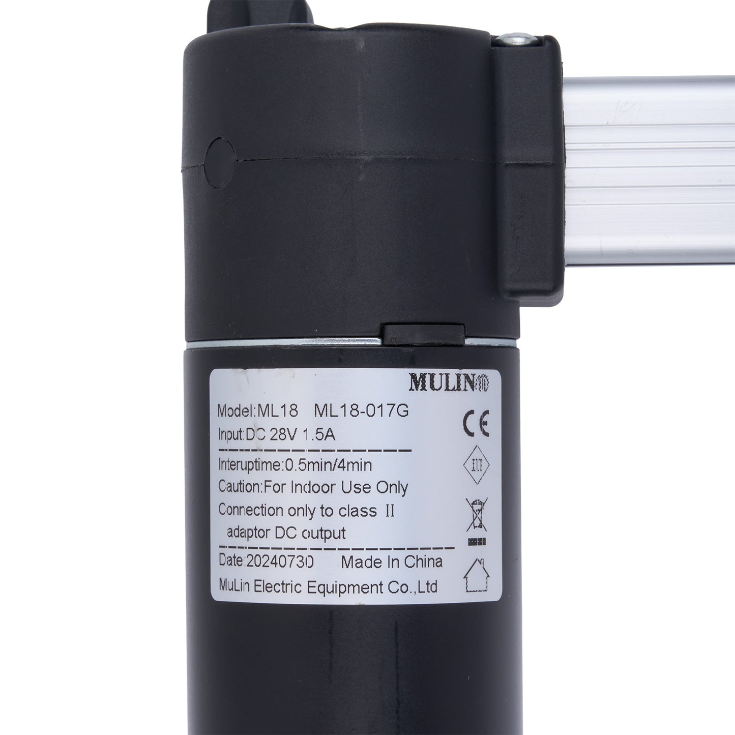Black electronic component with label on a white background