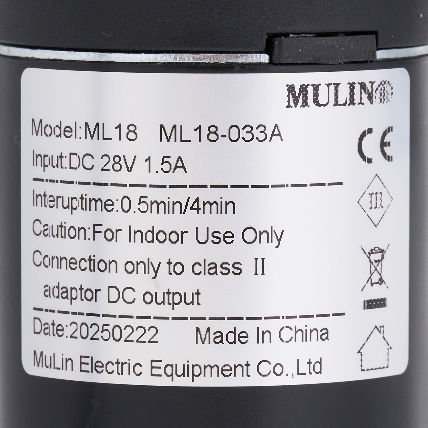 Label on a black electronic device with technical specifications and branding.